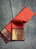 Rust orange Kanchipuram silk saree