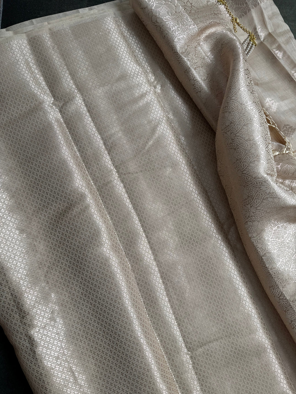 Off white with silver weaves chania silk saree