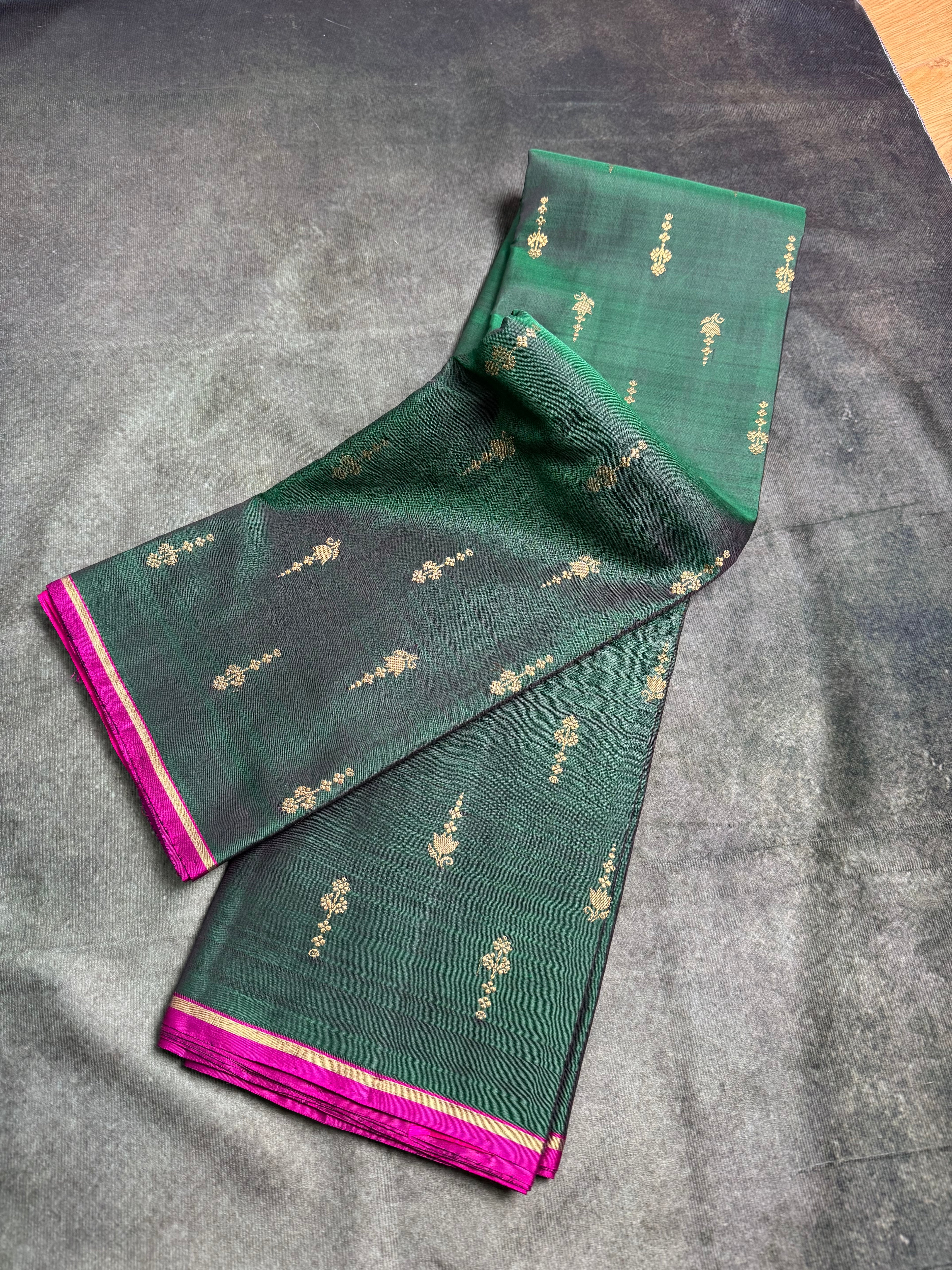 Emerald green borderless Kanchipuram silk saree