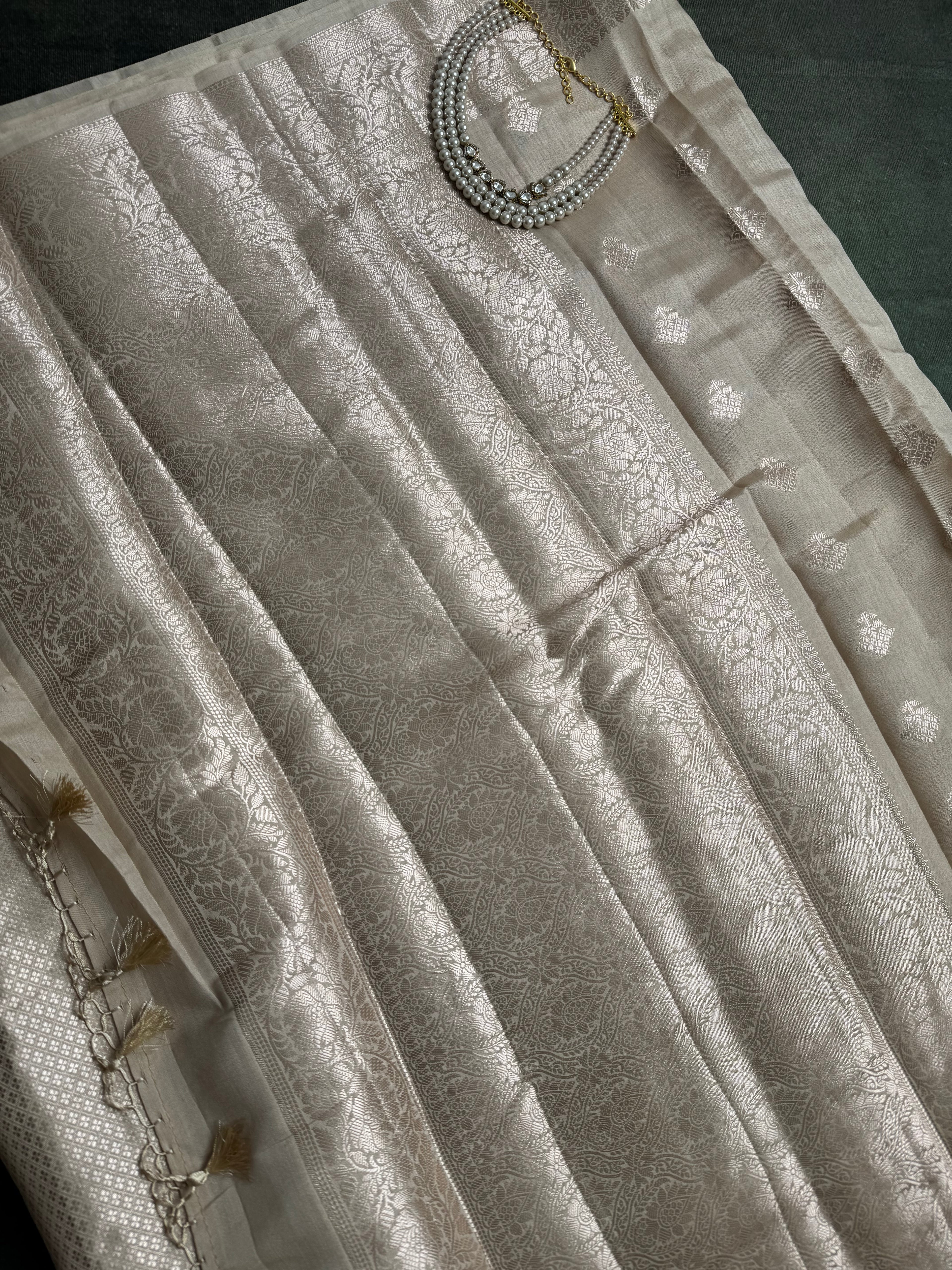 Off white with silver weaves chania silk saree