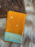 Yellow semi silk saree with sky blue border