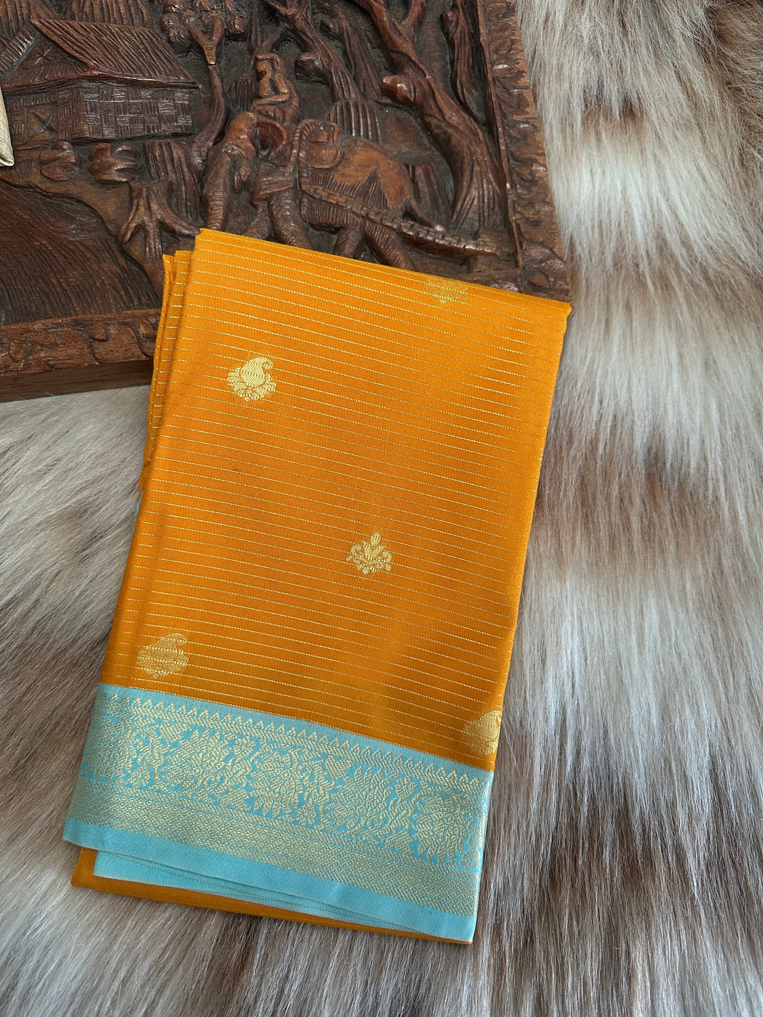 Yellow semi silk saree with sky blue border