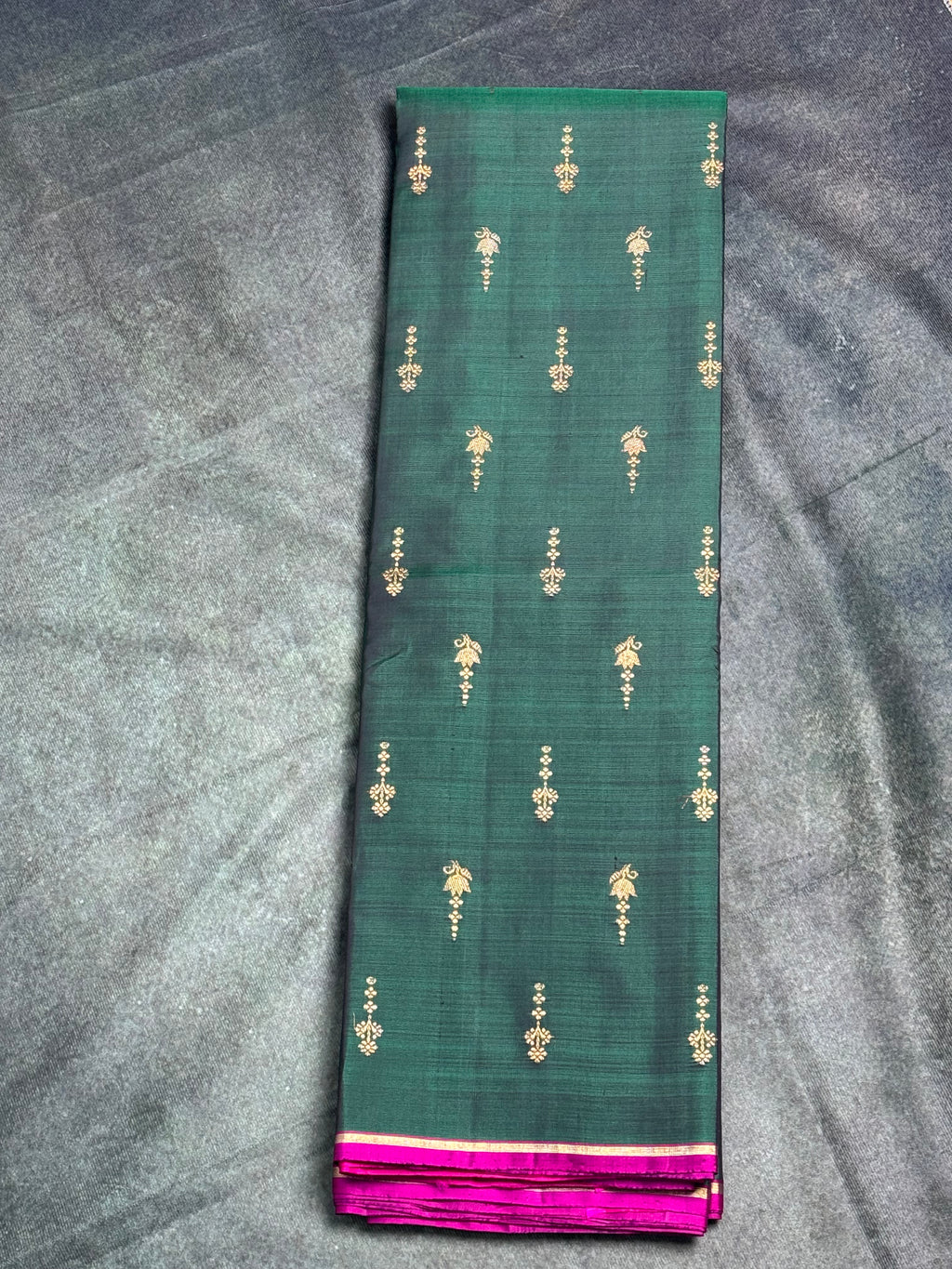 Emerald green borderless Kanchipuram silk saree