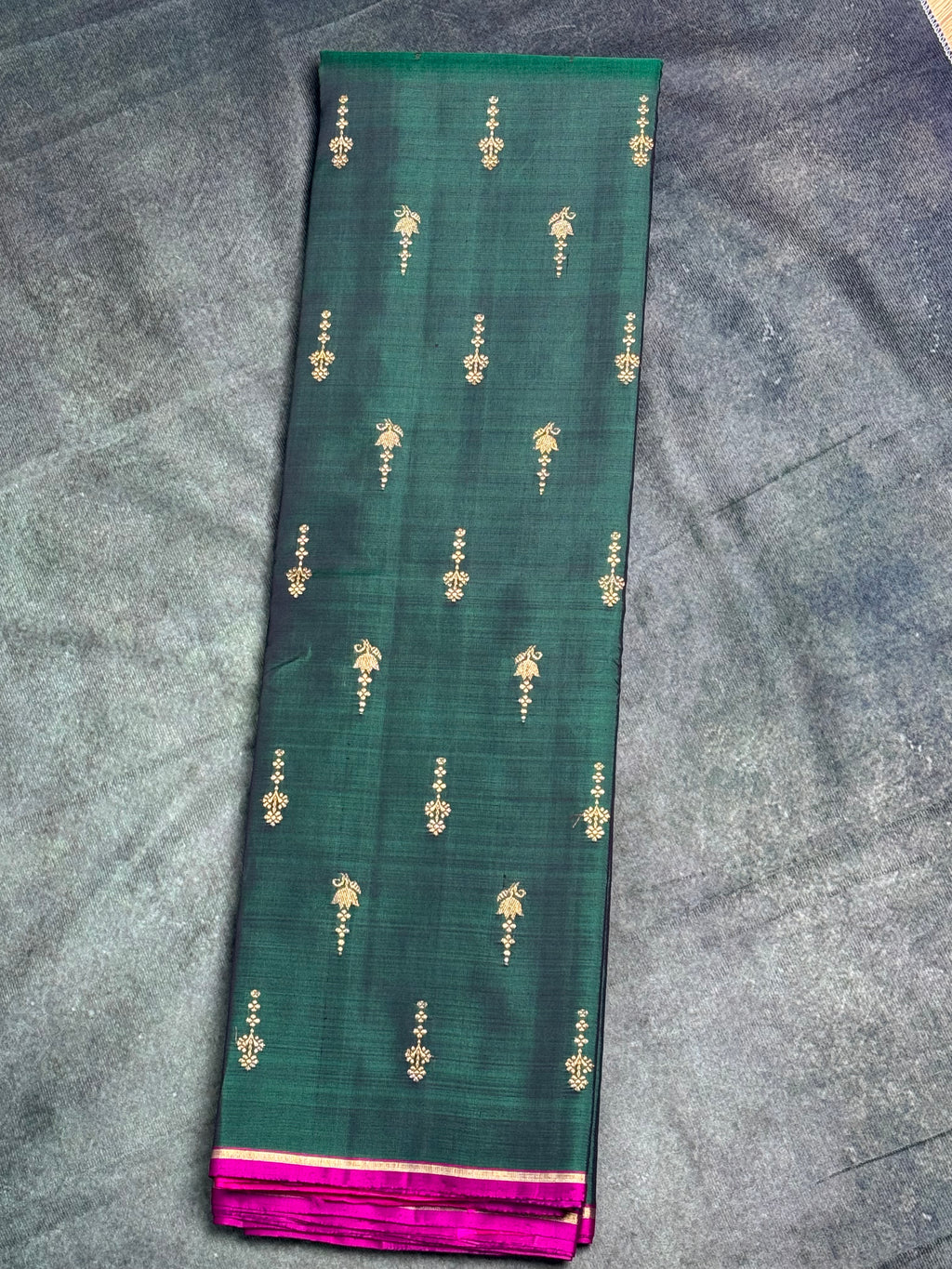 Emerald green borderless Kanchipuram silk saree