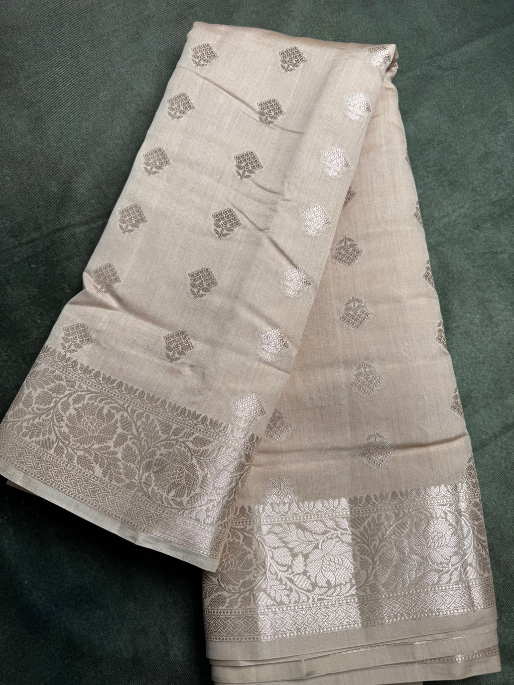Off white with silver weaves chania silk saree