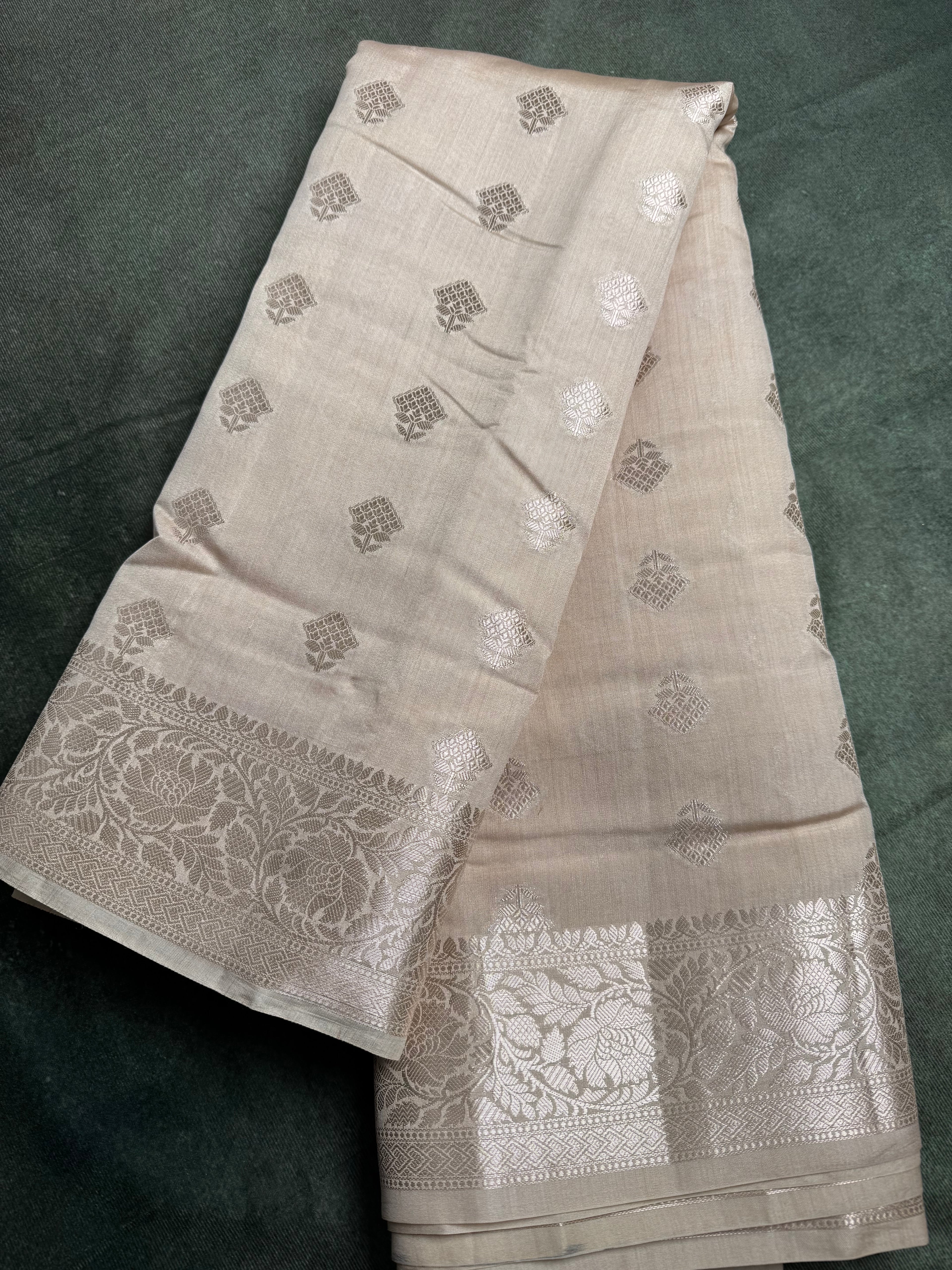 Off white with silver weaves chania silk saree